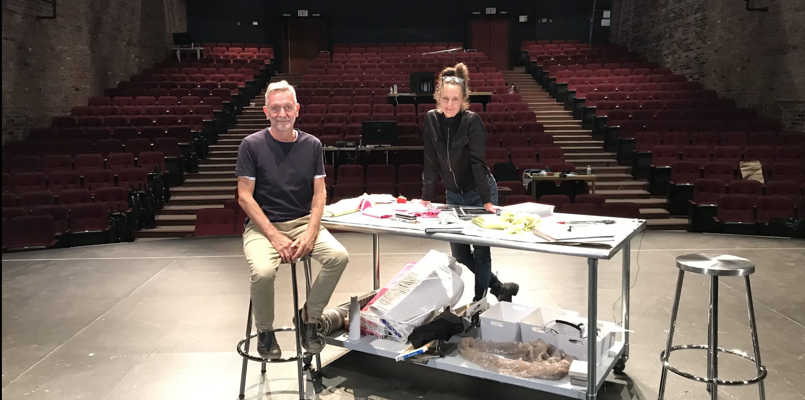 Michel Marc Bouchard and Eda Holmes sit on a stage at Centaur Theatre