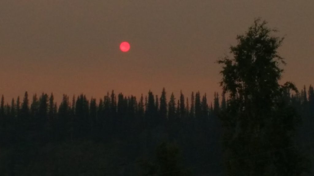 A midday forest fire sun in the Yukon, photo by Adjani Poirier 